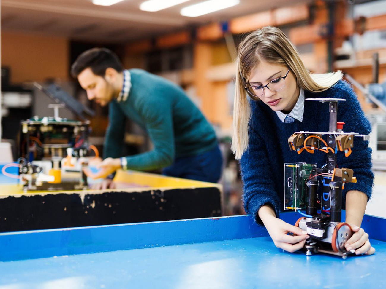 young-student-of-robotics-working-on-project-S32GWUC