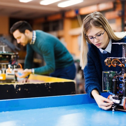 young-student-of-robotics-working-on-project-S32GWUC