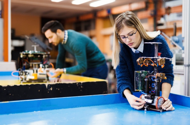 young-student-of-robotics-working-on-project-S32GWUC